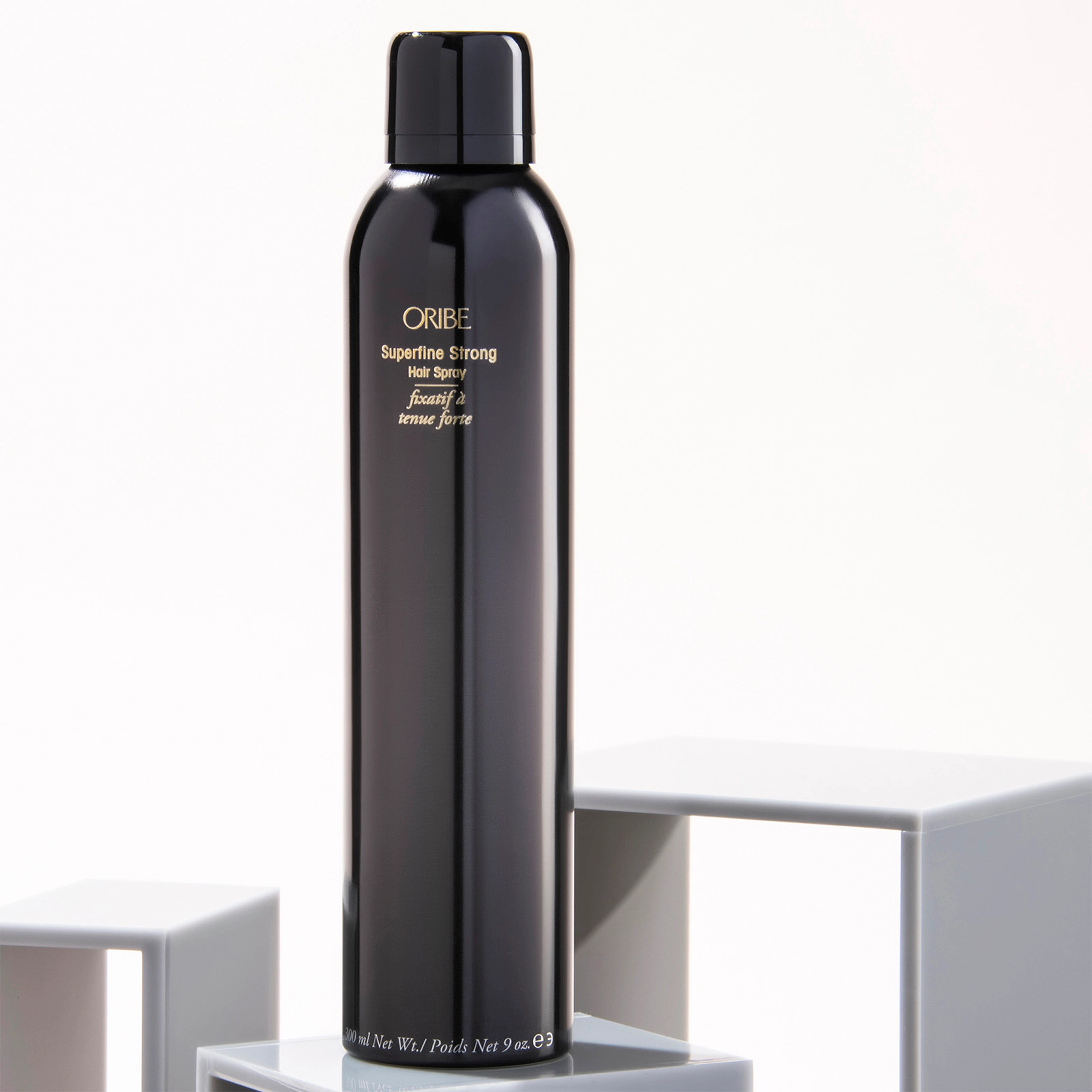Спрей для надсильної фіксації "Лак-невагомість" Superfine Strong Hair Spray ORIBE Обʼєм 301 мл — фото 4